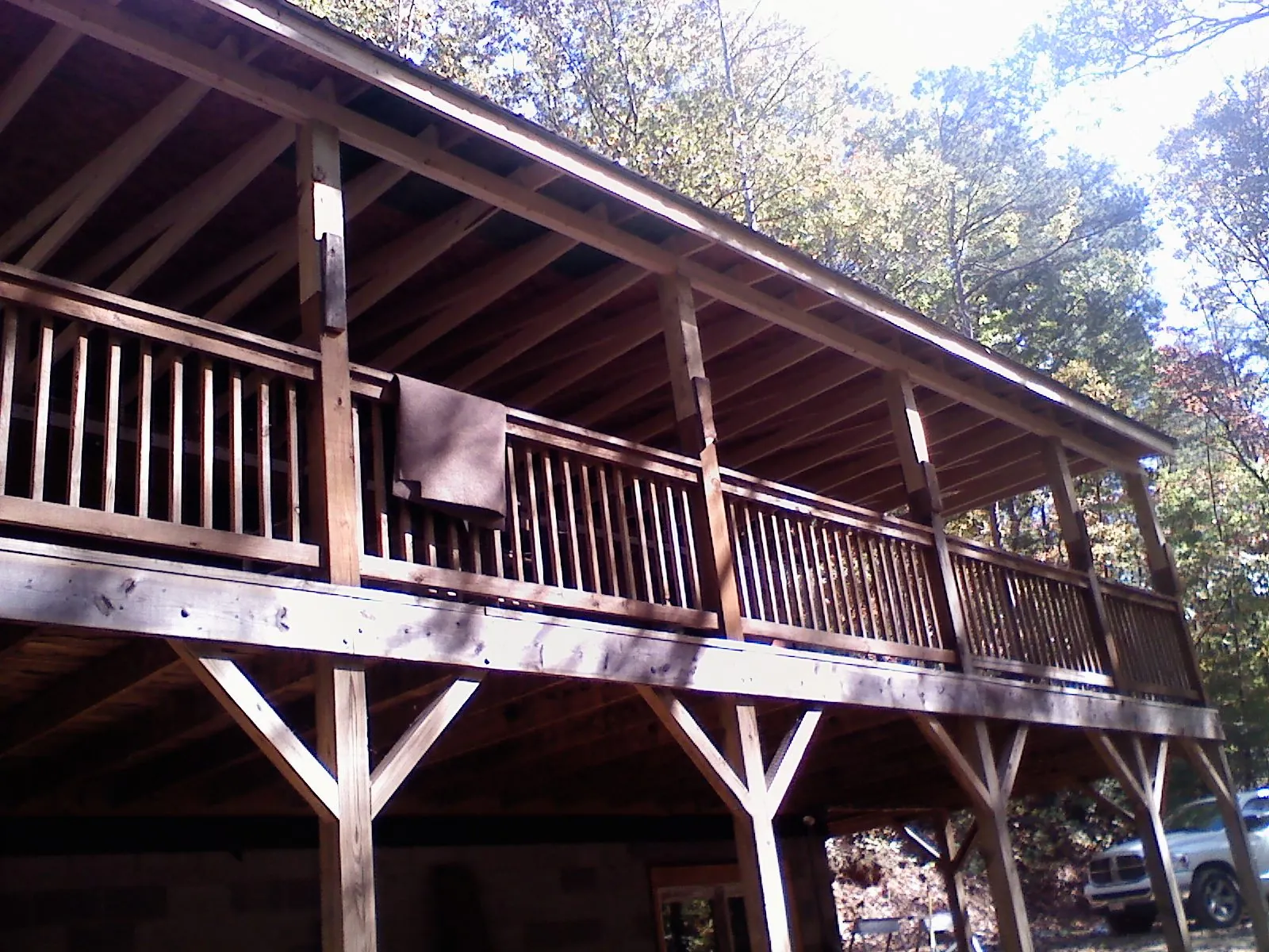 Timber framing under a new elevated porch and deck — Roof Leak Repair in Rolling Prairie by Roofing Brothers